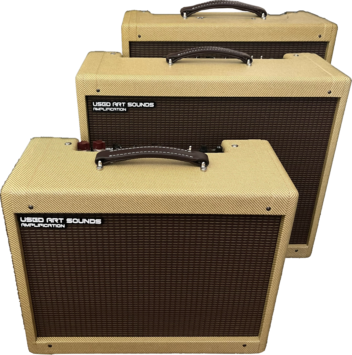 A stack of three large amps. With leather handles on top.